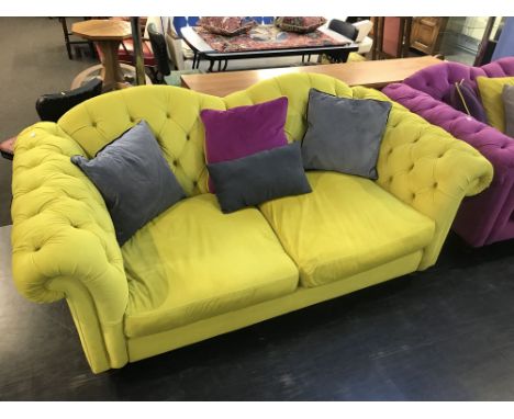 A Joules mustard coloured Chesterfield style three seater settee