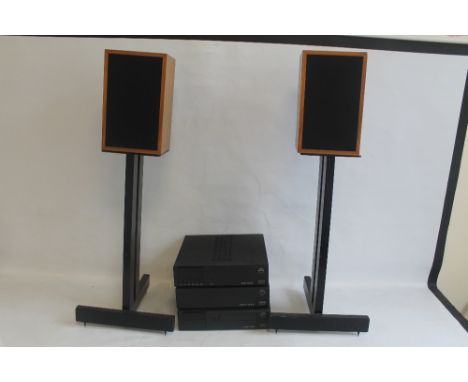 A LINN SOUND SYSTEM comprising 'Linn Majik' amplifier, 'Linn Numerik' tuner, 'Linn Karik' CD player and a pair of 'Linn Kan' 