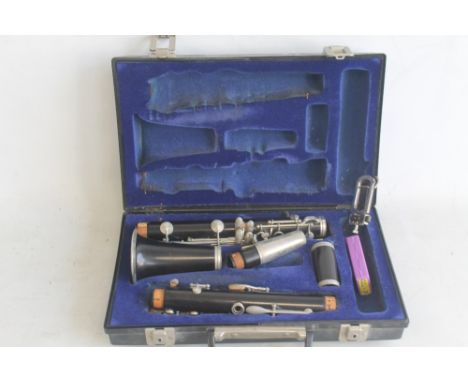A VINTAGE EVETTE CLARINET IN CASENote: was bought new in early 1970s and only played for a short time