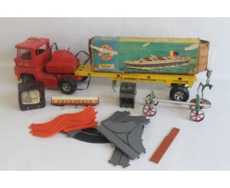 A BOXED MAMOD LUMBER WAGON LW.1, A BOXED SCALEX BOATS PLASTIC CLOCKWORK M.S, MERCHANT CARGO SHIP WITH KEY, a Topper Johnny Ex