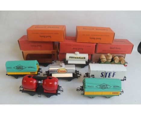 A BOXED FRENCH HORNBY SERIES "0" GAUGE 4 BARREL WAGON, together with seven boxed French Hornby trains "0" gauge rolling stock