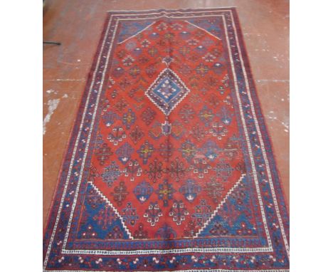 A Hamadan carpet 320 x 158cm and a Tibetan rug 140 x 75cm 