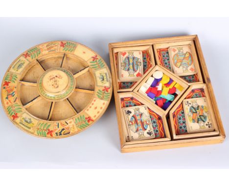 A late 19th Century wooden Pope Joan Board, with red and white bone counters and a boxed card games box with one set of vinta