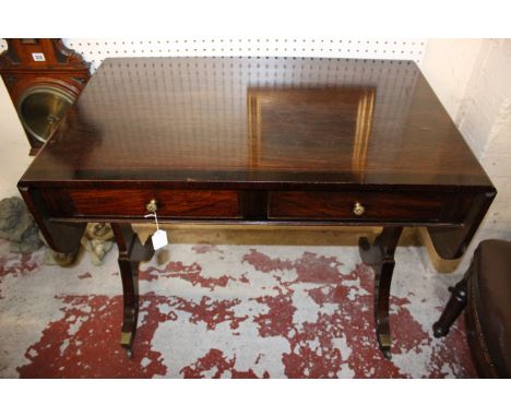 A mahogany drop leaf sofa table in George III style late 19th/early 20th Century 73cm high, 141cm wide, 58cm deep 