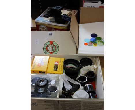 Camera accessories, lenses, filters, light meters , tripod and portrait screen. 