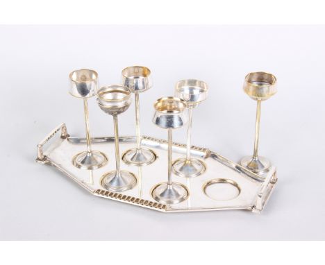 A set of six Art Deco WMF silver plated liqueur goblets, each with shaped bowl on slender stem and stepped circular foot with
