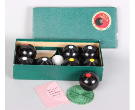 A B&A Carpet Bowls Indoor Game, four pairs of bowls, a jack and a rubber mat in it's original box.