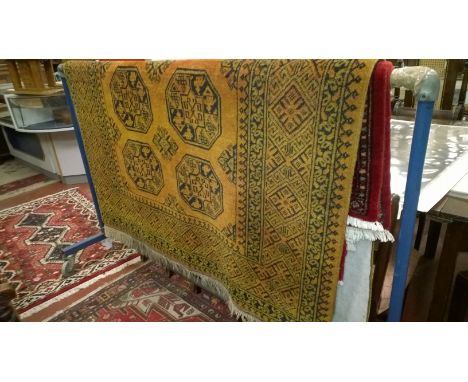 An Afghan carpet 160 x 190cm and a red ground runner