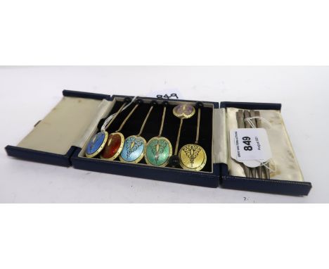 A lot comprising a set of six (one def ) silver gilt and enamel coffee spoons &amp; a set of four silver bridge pencils Condi