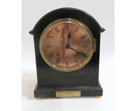 An ebonised dome top mantle clock with copper face, the mechanism marked W&amp;H SCH, has key and pendulum Condition Report: 