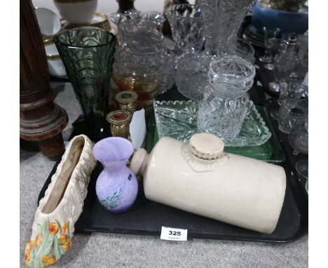 A lot comprising a quantity of cut glass and crystal vases, pitchers, bowls, amber coloured glasses, an Art Deco green glass 