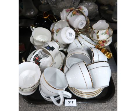 A lot comprising a Royal Stafford 'Bouquet' pattern part tea service, a Queen's Golden Jubilee gilt decorated part tea servic