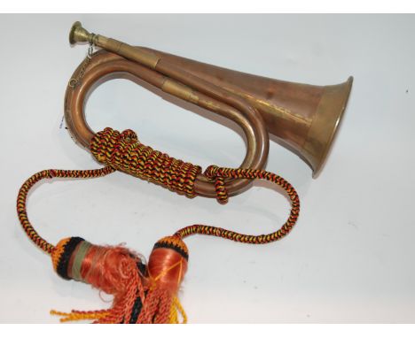 A brass bugle Condition Report: Available upon request
