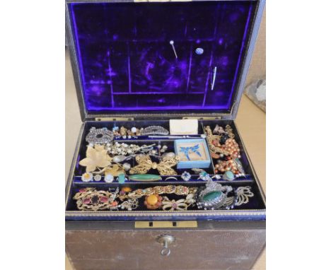 A jewellery casket filled with vintage costume jewellery, to include Deco items etc Condition Report: Not available for this 