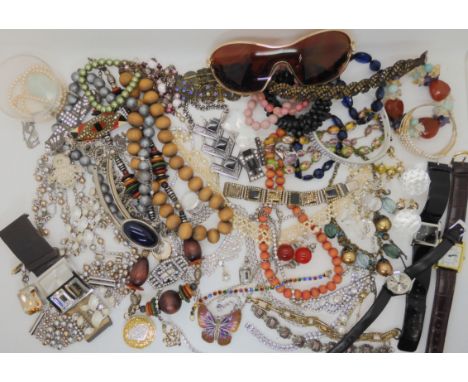 A collection of vintage costume jewellery, Swarovski and Daniel Swarovski items and designer sunglasses Condition Report: Not