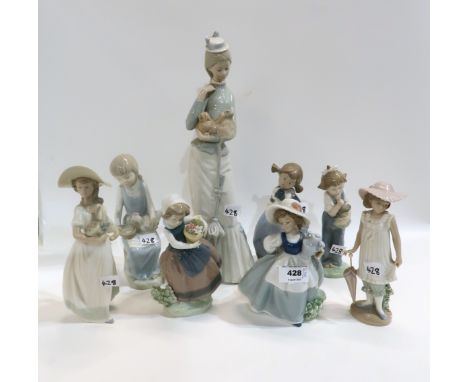 A collection of Nao and Lladro figures and one other figure Condition Report: All in good condition. 