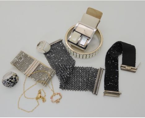 Three Daniel Swarovski cuff bracelets, a Curiousa bangle, a watch and ring with further Swarovski items Condition Report: Not