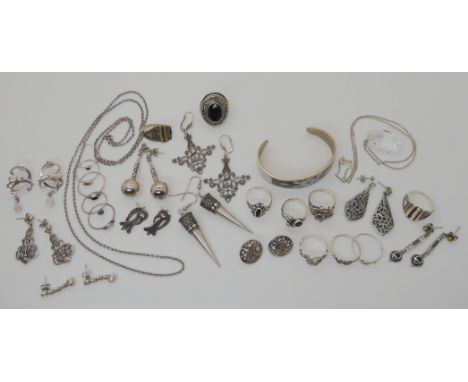 A collection of silver and costume earrings, rings and a bangle Condition Report: Not available for this lot
