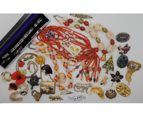 A collection of vintage costume jewellery, to include animal brooches, silver Mackintosh style bracelet and earrings Conditio