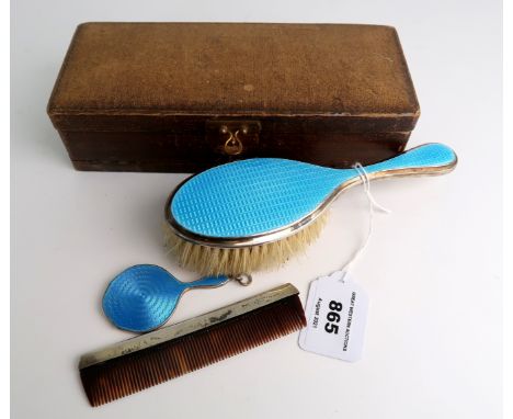 A silver and enamel brush, comb and mirror set, Birmingham 1928 Condition Report: Available upon request