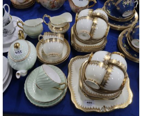 A Plant Tuscan cream and gilt teaset and a green glazed Foley bachelor set Condition Report: Available upon request
