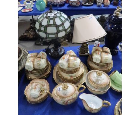 A leaded glass table lamp and  Limoges blush ivory and flower decorated tea wares and others Condition Report: Available upon