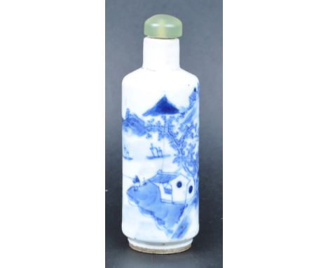 A 19th Century Chinese blue &amp; white porcelain snuff bottle / scent bottle of cylindrical form. Green stone / jade type st