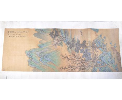 A 19th Century Chinese hand painted paper scroll. Depicts a landscape scene with set of buildings within trees and mountain s