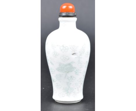 A 19th Century Chinese Celadon ground porcelain snuff bottle / scent bottle of Meiping shape. Orange stone bead stopper to to