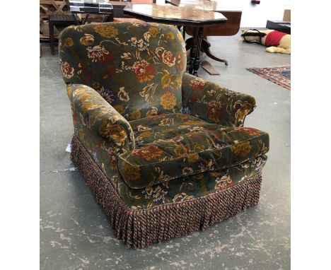 A large country house armchair and matching pouffe