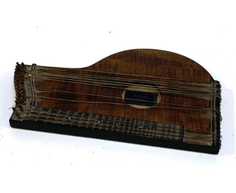 A 19th century German zither, bearing label for Ignaz Siman of Haidhausen, 48cmL 