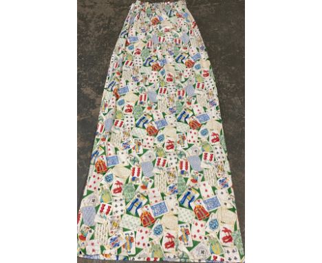 A pair of lined curtains, in a playing card pattern on a green ground, 183x240cm 
