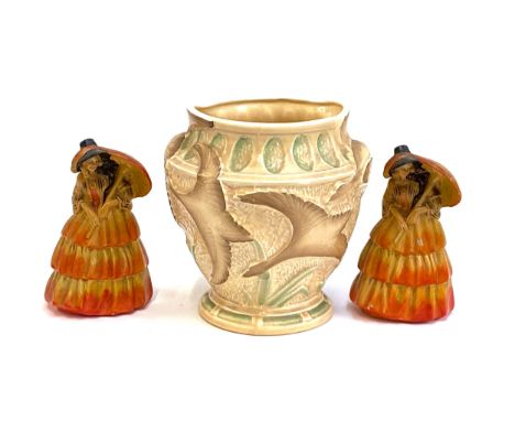 An Art Deco Burleigh ware 'Flying Geese' vase, 21cmH; together with two Wade 'Sunshine' lady figurines, 16cmH (3) 