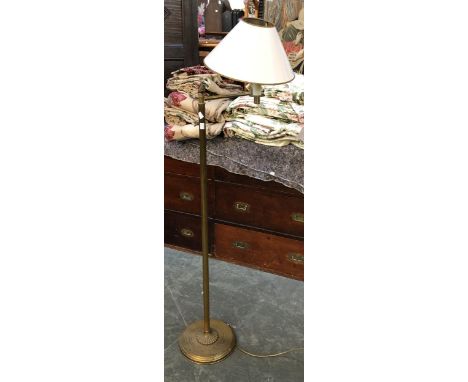 A gilt metal adjustable standard lamp, 138cmH 