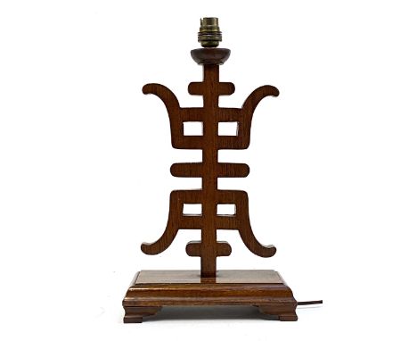 Interior design interest: A Chinese carved wooden table lamp, 39.5cmH 