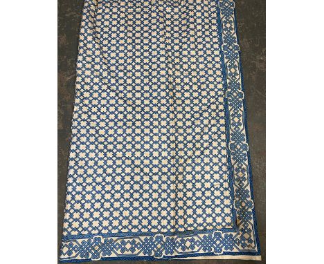 A long pair of lined chintz curtains, blue interlocking pattern, 240cm wide ungathered, 336cm drop 