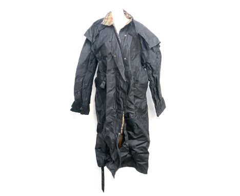 A Lavenir waxed cotton coat, size M, with check lining 