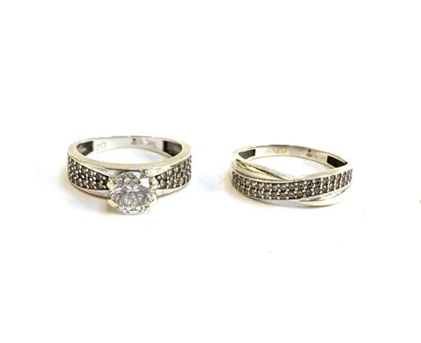 Two 9ct gold and cubic zirconia set rings, size K and L, gross weight 3.9 