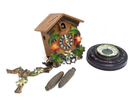 A cuckoo clock (af); together with a wall barometer 