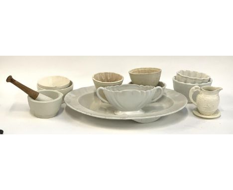 A mixed lot of white ceramics to include a Dartmouth Devon twin handled flower vase, mortar and pestle, Wedgwood hunting jug 