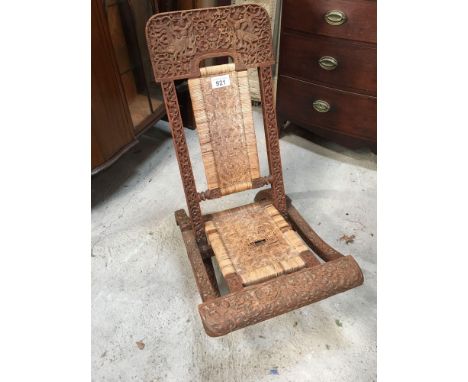  Sale Item:    CARVED WOODEN FOLDING CHAIR (AF)   Vat Status:   No Vat   Buyers Premium:  This lot is subject to a Buyers Pre
