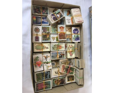  Sale Item:    TIN ASSORTED CIGARETTE CARDS(AF)   Vat Status:   No Vat   Buyers Premium:  This lot is subject to a Buyers Pre