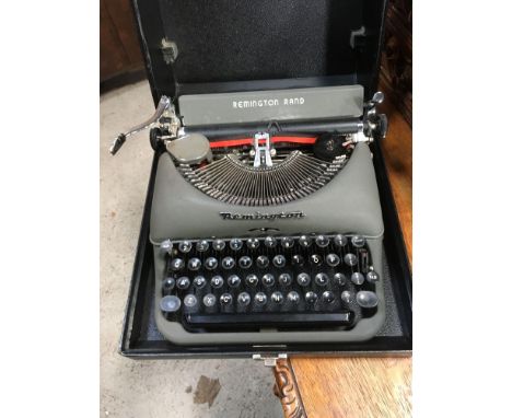  Sale Item:    CASED REMINGTON RAND TYPEWRITER (AF)  Vat Status:   No Vat   Buyers Premium:  This lot is subject to a Buyers 