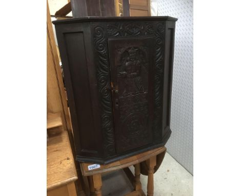  Sale Item:    OAK CARVED CORNER CABINET   Vat Status:   No Vat   Buyers Premium:  This lot is subject to a Buyers Premium of