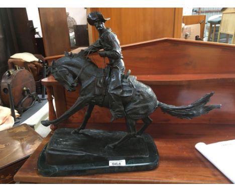  Sale Item:    METAL ORNAMENT THE COWBOY BY FREDERIC REMINGTON  Vat Status:   No Vat   Buyers Premium:  This lot is subject t