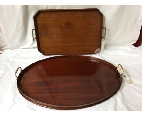  Sale Item:    2 BRASS HANDLED WOODEN TRAYS(AF)   Vat Status:   No Vat   Buyers Premium:  This lot is subject to a Buyers Pre