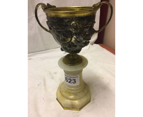  Sale Item:    URN ON STAND   Vat Status:   No Vat   Buyers Premium:  This lot is subject to a Buyers Premium of 15% + Vat @ 