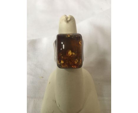  Sale Item:    AMBER STONE RING   Vat Status:   No Vat   Buyers Premium:  This lot is subject to a Buyers Premium of 15% + Va