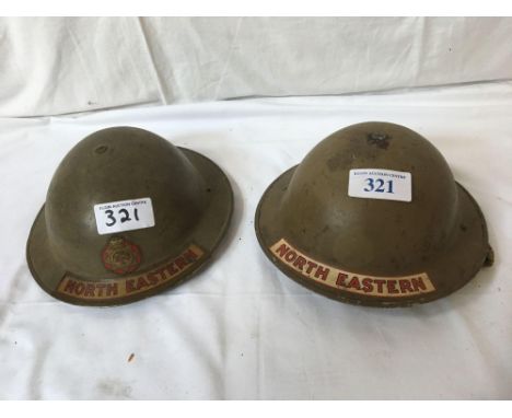  Sale Item:    2 METAL HELMETS NORTH EASTERN (AF)  Vat Status:   No Vat   Buyers Premium:  This lot is subject to a Buyers Pr