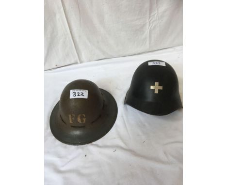  Sale Item:    2 METAL HELMETS + &amp; FG (AF)   Vat Status:   No Vat   Buyers Premium:  This lot is subject to a Buyers Prem